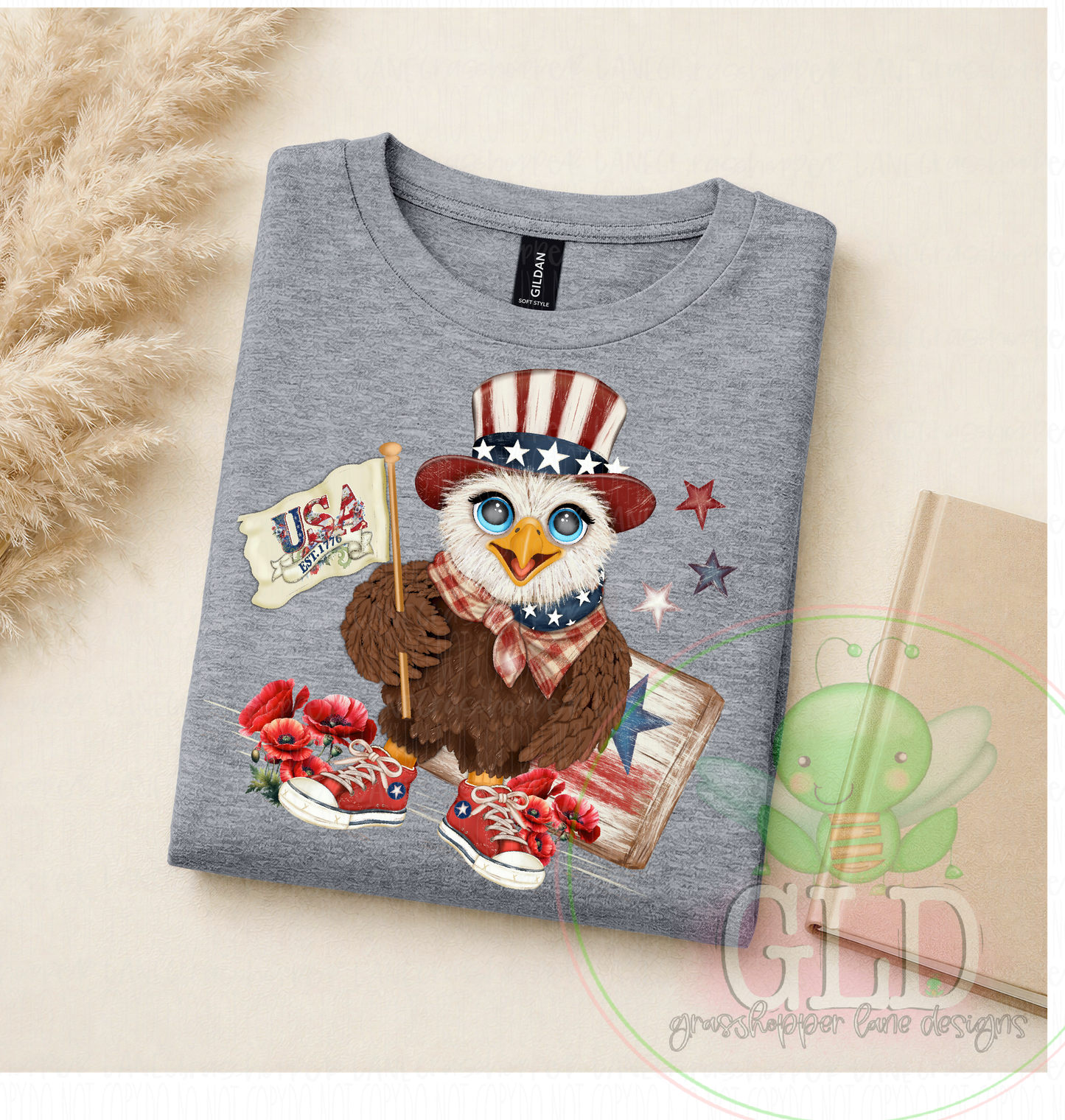 Heather gray t-shirt featuring Uncle Beak eagle graphic with Americana flag details and patriotic red white and blue theme.