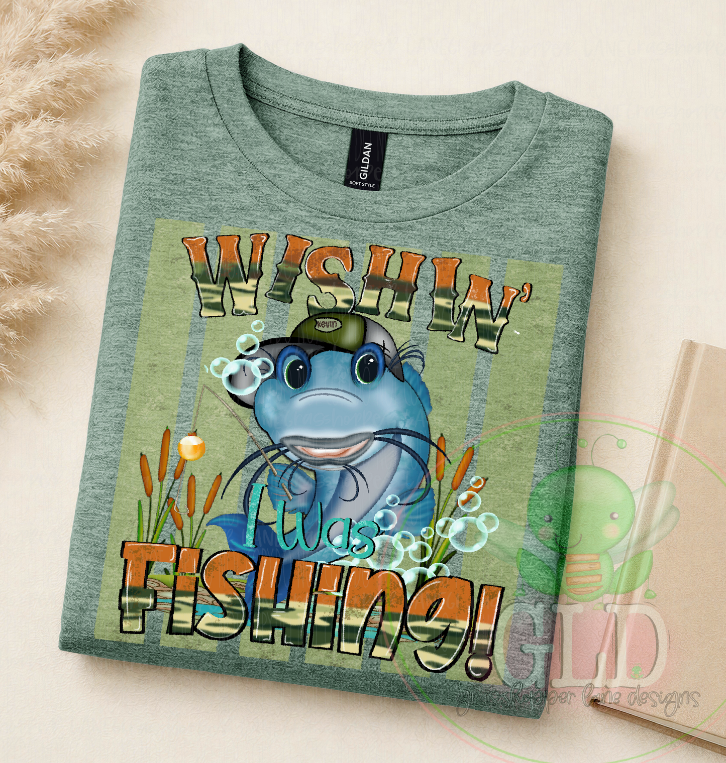 Funny fishing slgrapic tee with Kevin Catfish design on Heather Green Gildan Shirt