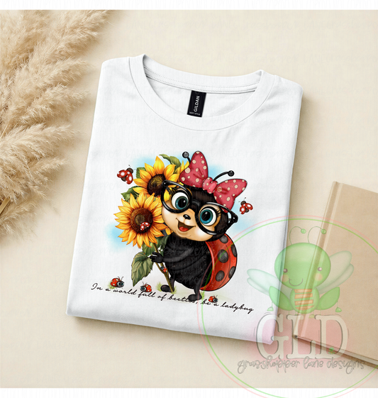 Doris “the lady” Bug– "In a World Full of Beetles, Be a Ladybug" Sunflower Tee