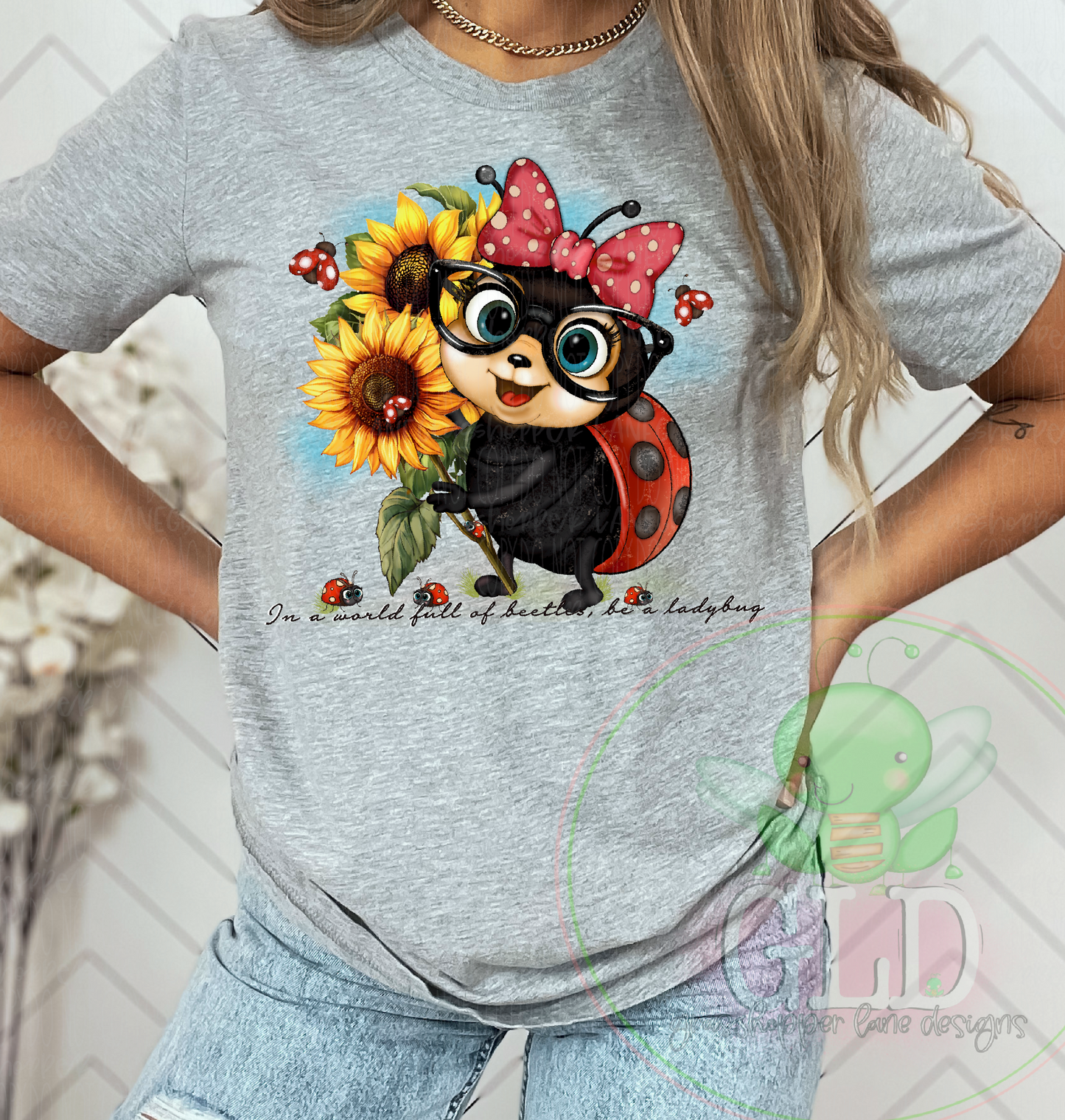 Doris “the lady” Bug– "In a World Full of Beetles, Be a Ladybug" Sunflower Tee