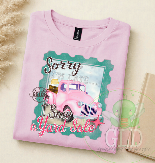Vintage pink truck graphic tee featuring the phrase "Sorry I'm Late...I Saw a Yard Sale" on Gildan shirts in pink and gray