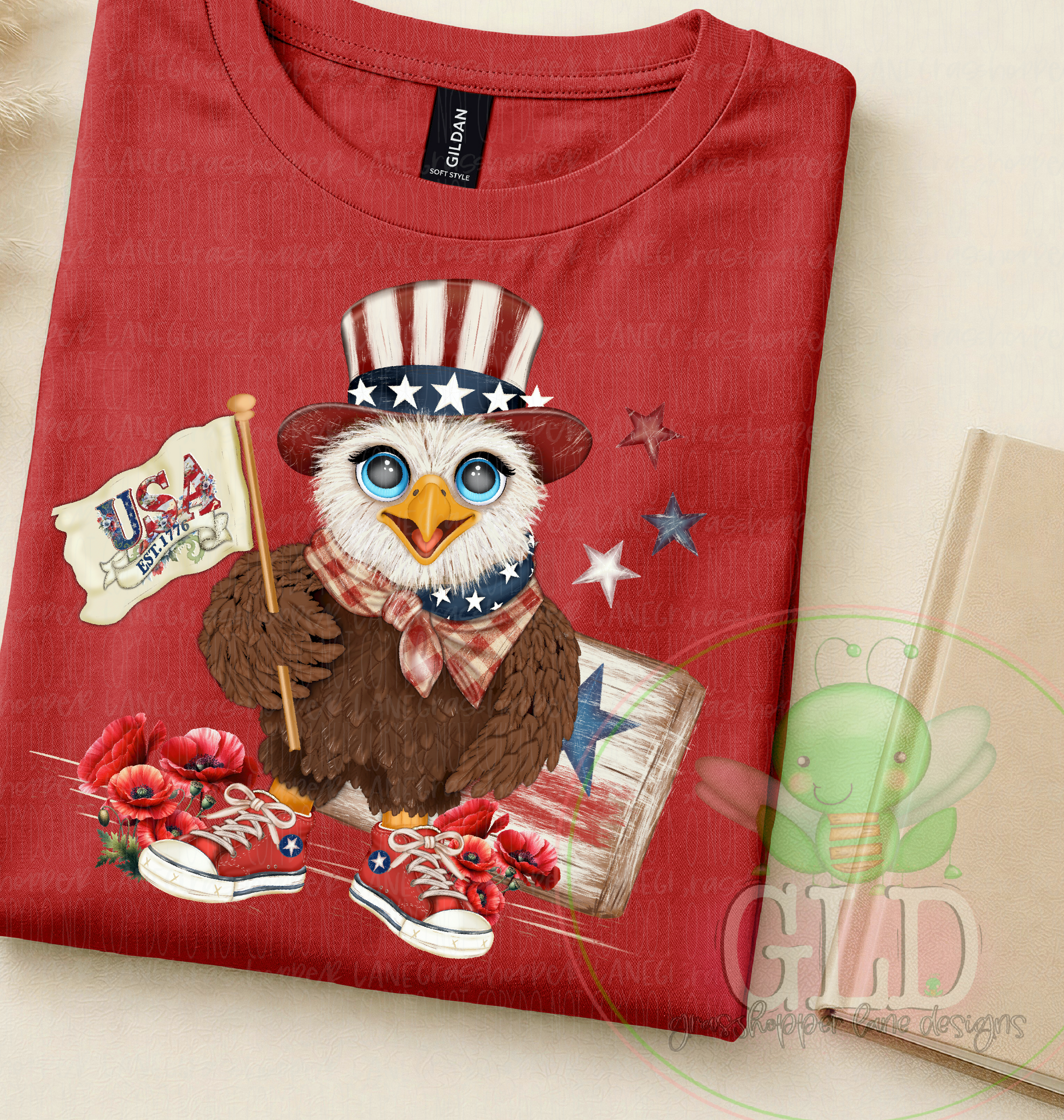 Red t-shirt featuring Uncle Beaky patriotic eagle graphic with patriotic hat, USA flag and red poppy flowers